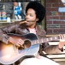 Alex Cuba with guitar